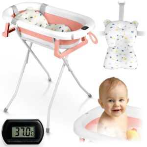 Összecsukható babafürdető kád állvánnyal RK-287, fehér-rózsaszín | A puha alátéttel és hőmérővel ellátott Ricokids kényelmes és biztonságos fürdetést biztosít.